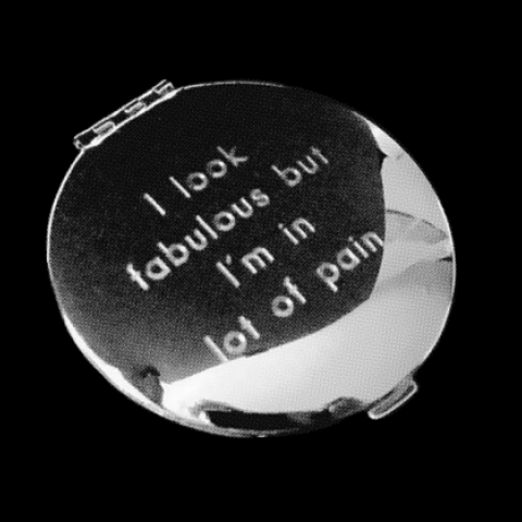 a silver keepsake pin has the engraving "I look fabulous but I'm in lot of pain"