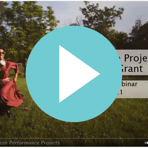 A light blue play button over a slide that reads "National Dance Project."