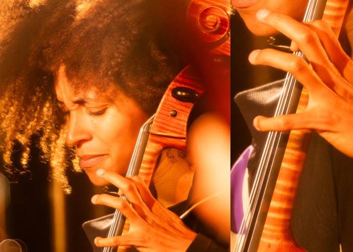 Repeating image of a Black woman playing the standing bass with a microphone in front of her.