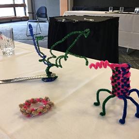 Multicolored pipe cleaner sculptures.