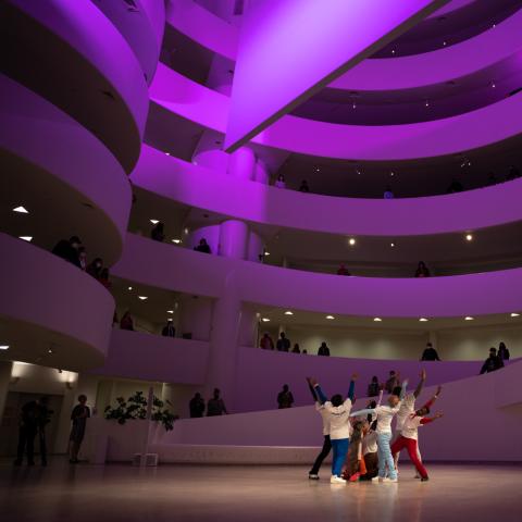 In the Guggenheim, with it's infamous spiral interior leading to the top floor, dancers perform on the ground level.