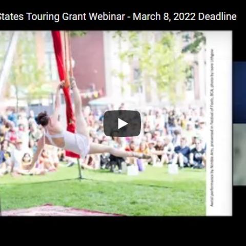 A screenshot of a webinar: a presentation with a photography of circus performers, an ASL interpreter, and a speaker.